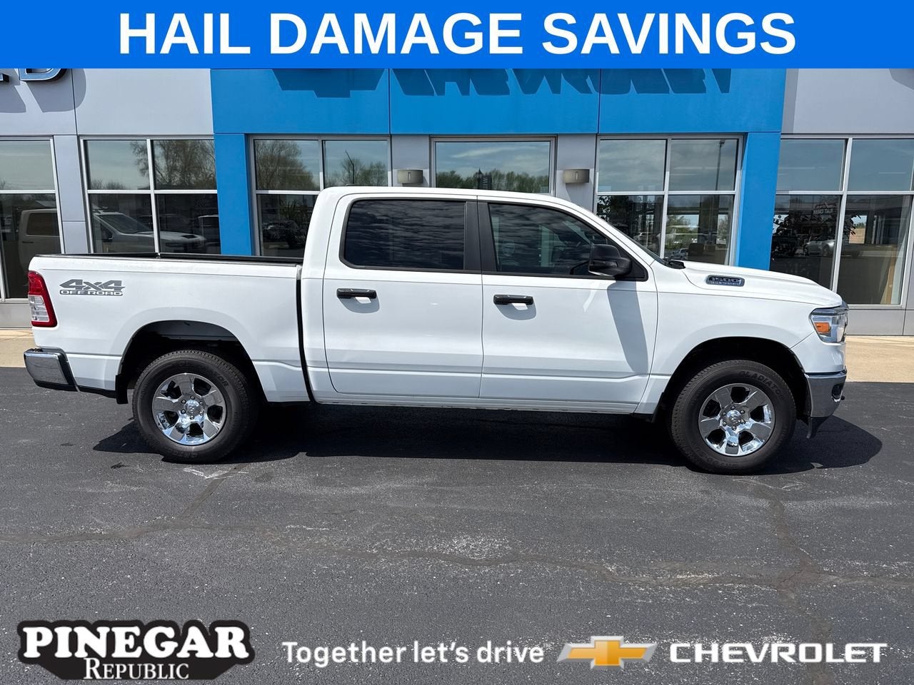 2023 RAM 1500 Big Horn Crew Cab 4x4 5'7" Box in White — front three-quarter view
