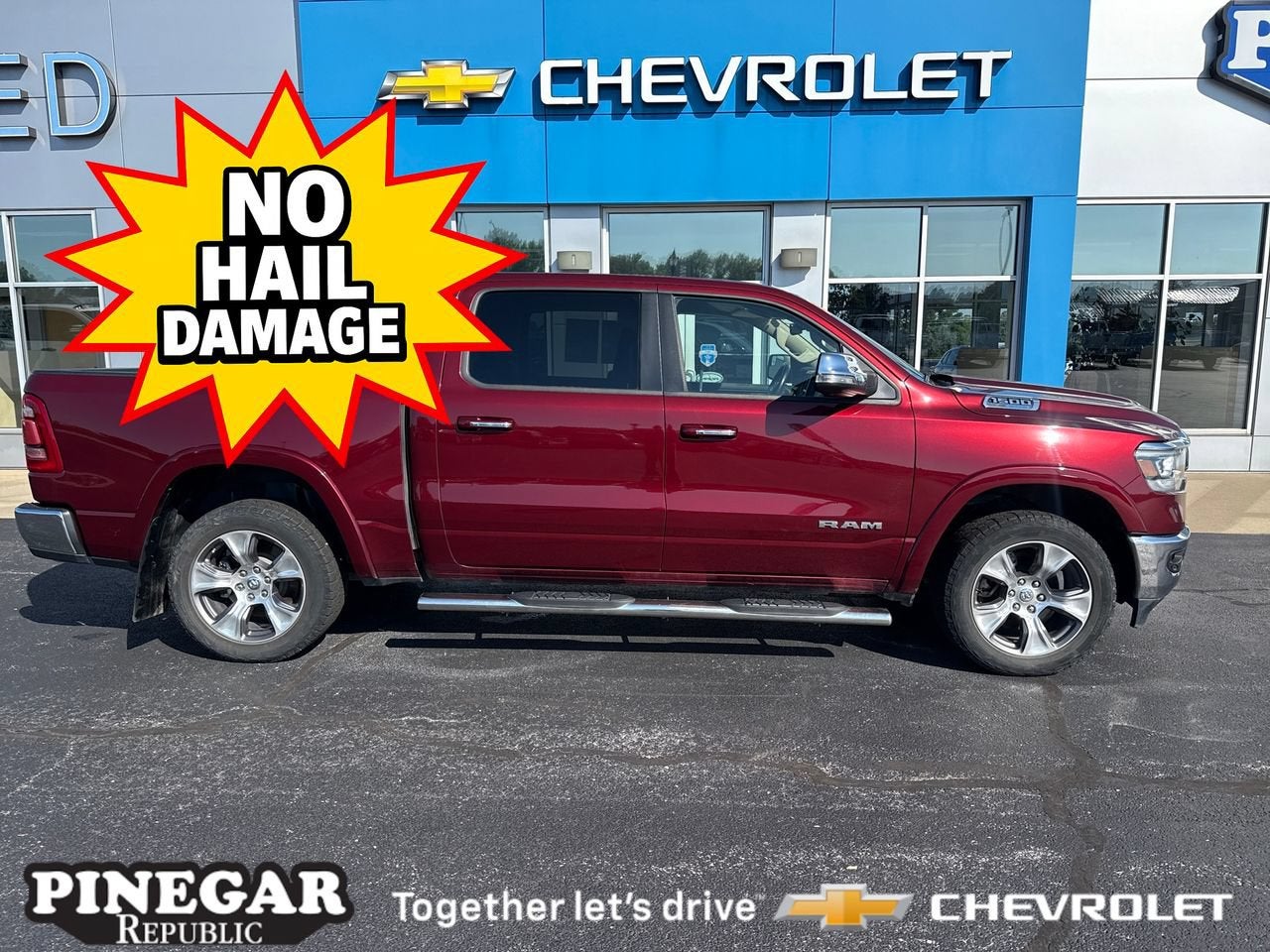 2021 RAM 1500 Laramie Crew Cab 4x4 5'7" Box in Red — front three-quarter view