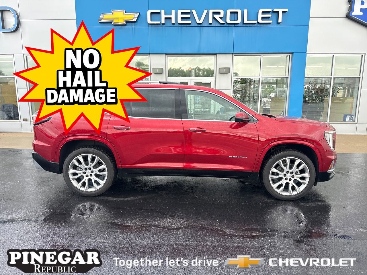 2025 GMC Acadia Denali in Volcanic Red Tintcoat — front three-quarter view