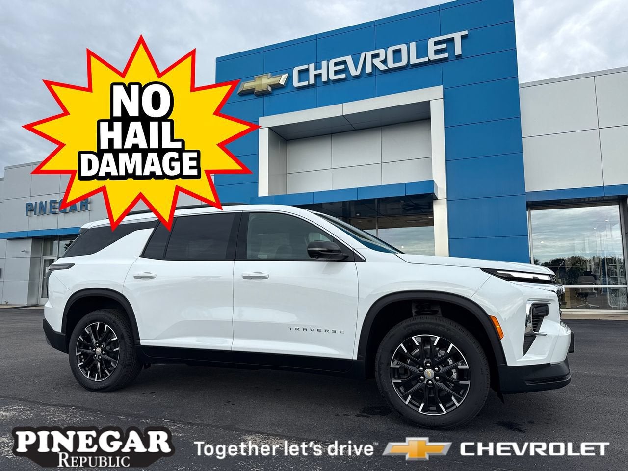 2026 Chevrolet Traverse LT in Summit White — front three-quarter view