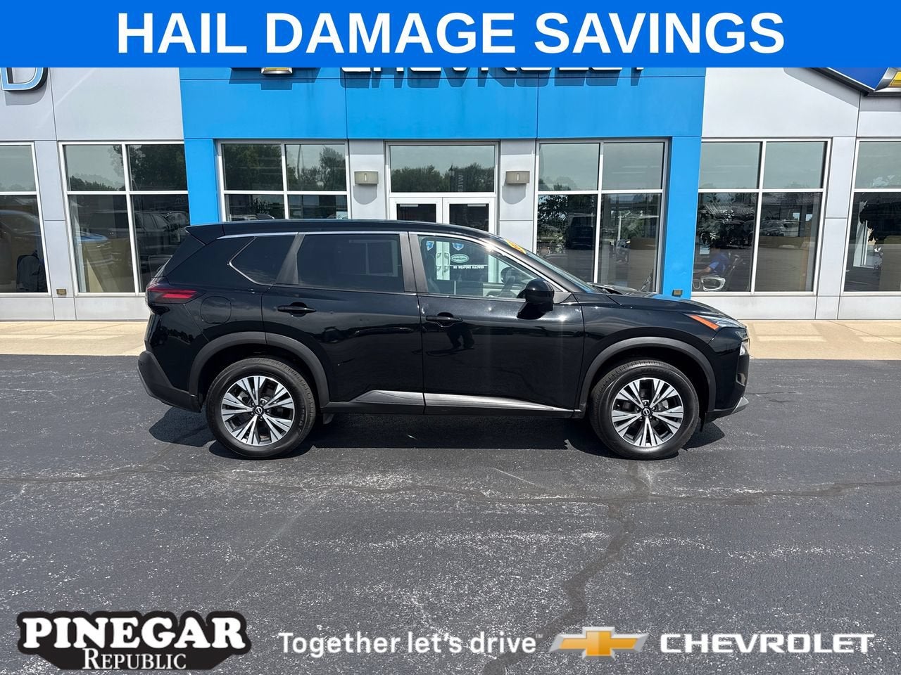 2023 Nissan Rogue SV Intelligent AWD in Black — front three-quarter view